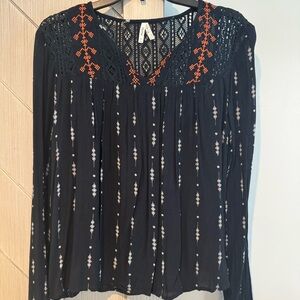 Black Blouse with Orange and White Accents
